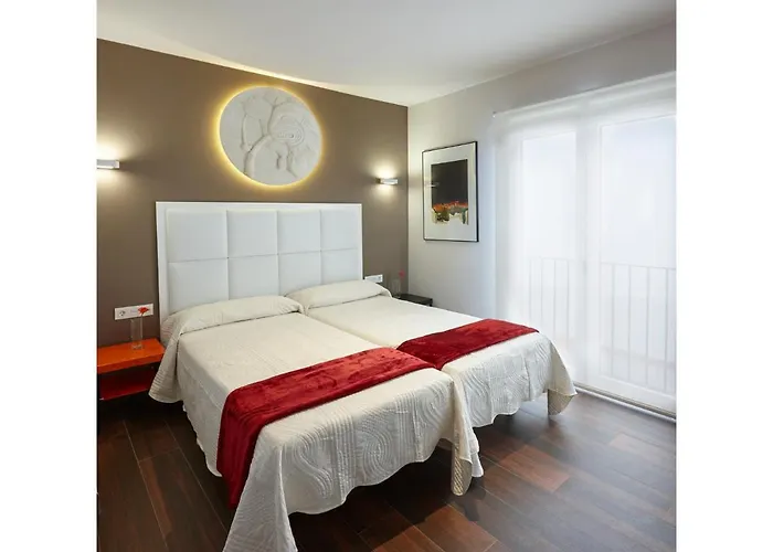 Apartamentos Caballerizas Granada con parking gratuito en pleno centro